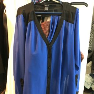Bright blue and black blouse